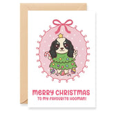 Christmas card with a dog illustration and 'Merry Christmas to my favourite hooman!' text.
