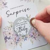 Personalised scratch-to-reveal surprise card with floral design and hidden message for travel, pregnancy, or proposal.