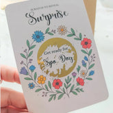 Bright floral wreath design with scratch reveal area