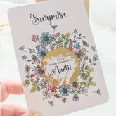 Surprise scratch card with gold sticker and hidden message