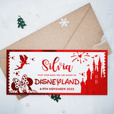 Invitation card to Disneyland with castle and fairy design, placed on a white background with decorative elements.