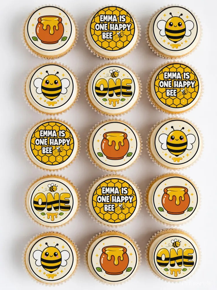 Cute yellow and black bumble bee cupcake toppers with honey pot designs for bee first birthday celebrations