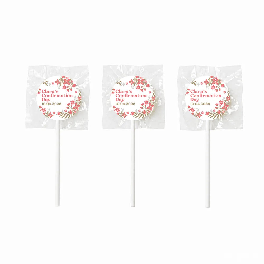 Three personalised white lollipop favours with pink floral wreath and blossoms for clara’s confirmation day 10.04.2026
