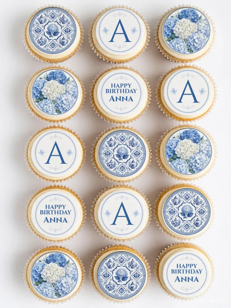 Blue and white chinoiserie birthday cupcake toppers with floral pattern and decorative a initials for cakes