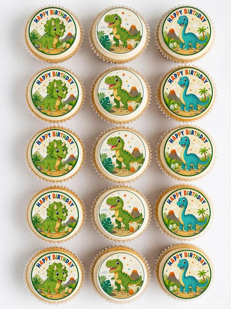 Blue dinosaur birthday edible cupcake toppers with green and blue dinosaur designs and happy birthday text on white background