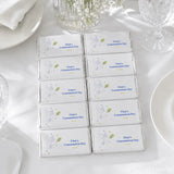 Personalised 40g white chocolate bar with royal blue text featuring a white dove and olive branch design