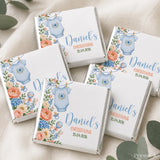 White chocolate mini neapolitan chocolates box with blue baby onesie and floral design personalized for daniels christening