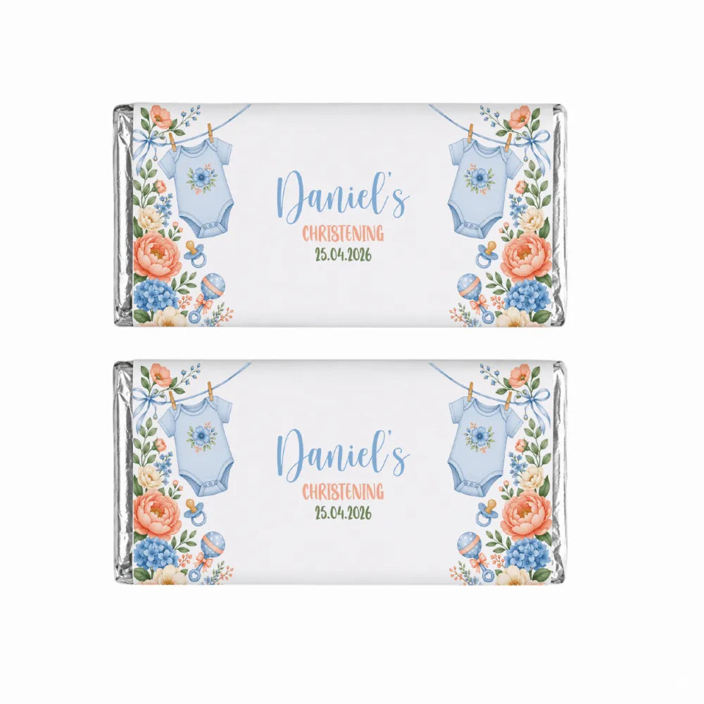 Two personalised 40g chocolate bars wrapped in silver foil with blue babygrow and floral labels for christening