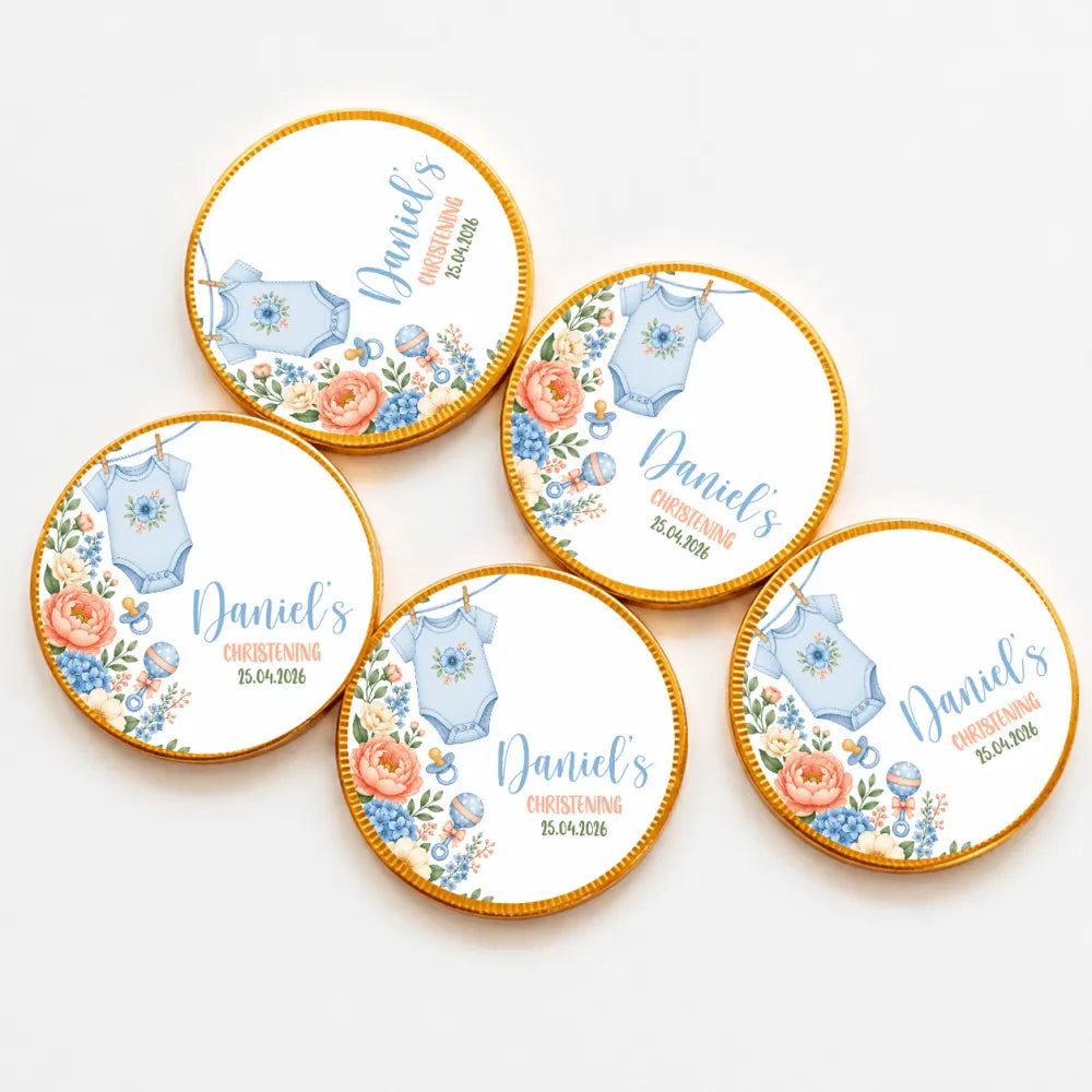 Round milk chocolate coins with gold edges featuring a blue babygrow design and personalized text for daniels christening