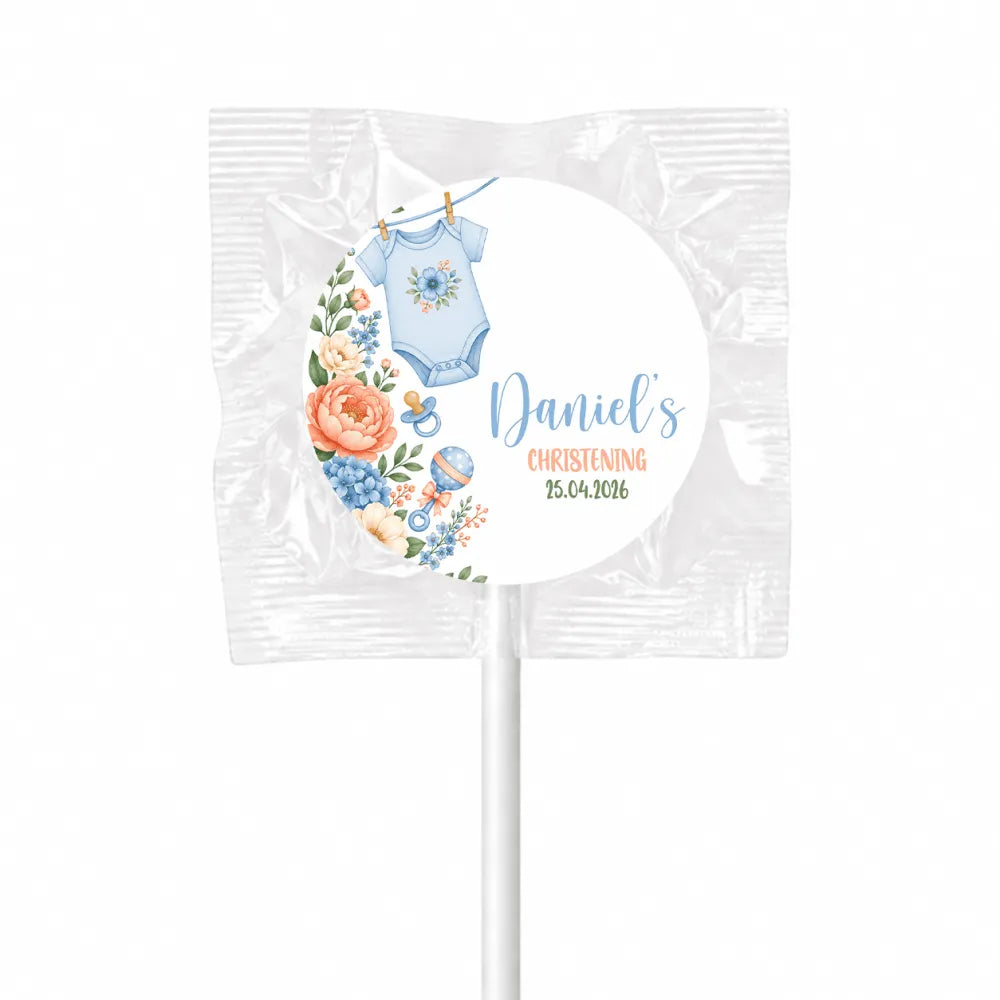 Personalised blue babygrow themed lollipop favours with floral design and event details for christening swirl lollipops