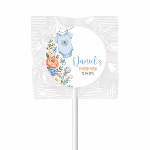 Personalised blue babygrow themed lollipop favours with floral design and event details for christening swirl lollipops