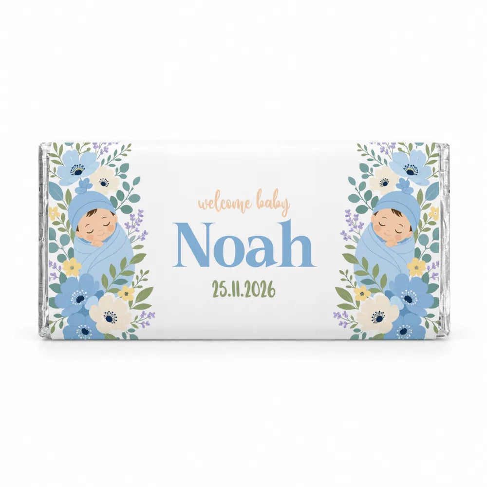 A personalized 40g white chocolate bar with a blue swaddle floral design featuring sleeping babies welcome baby noah 25 11 2026