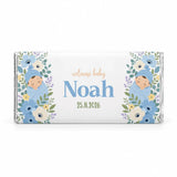 A personalized 40g white chocolate bar with a blue swaddle floral design featuring sleeping babies welcome baby noah 25 11 2026