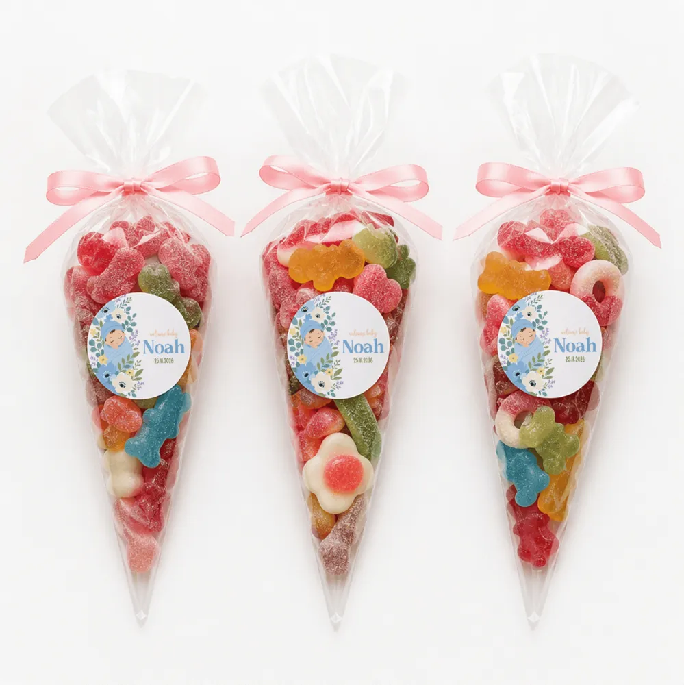 Three clear plastic sweet cones tied with pink ribbons and personalized blue swaddle labels for babies named noah