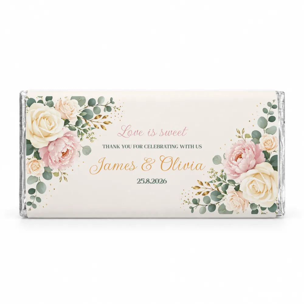 A personalised 40g chocolate bar with blush peony floral design in pink cream and gold on an off-white wrapper