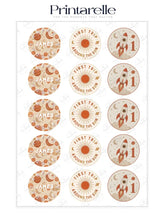 Boho space birthday cupcake toppers with circular earthy tone stickers featuring rockets and celestial designs