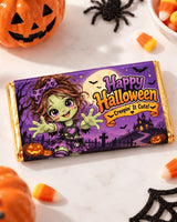 A purple and gold wrapped 100g bar with a cartoon zombie girl on a personalised halloween chocolate box wrap