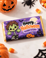 A 100g purple and gold halloween chocolate box wrap featuring a cute green zombie on the boo crew bar