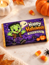 A purple and gold 100g halloween chocolate box wrap featuring a cartoon frankenstein for boo crew chocolate box