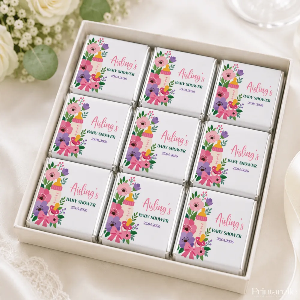 Pink and purple floral themed mini neapolitan chocolates in a white box for baby shower gift Bottle and Bloom Shower