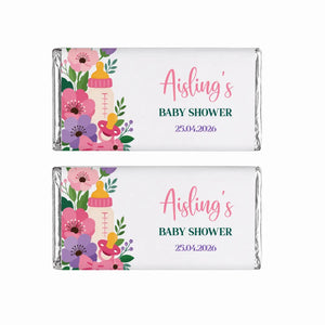 Two personalized 40g silver foil chocolate bars with pink purple floral baby bottle designs for baby shower gifts