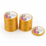 Golden milk chocolate coins with floral and text decals for a personalized baby shower gift called bottle and bloom shower