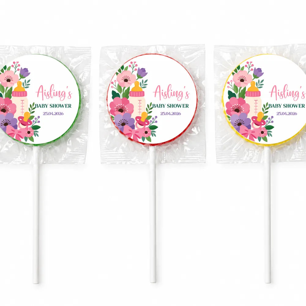 Three round colorful lollipop favours with baby bottle and floral designs perfect for baby shower gifts