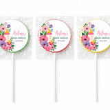 Three round colorful lollipop favours with baby bottle and floral designs perfect for baby shower gifts