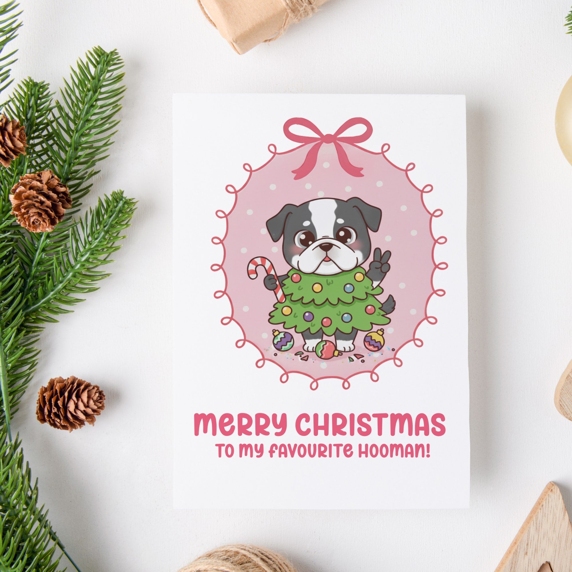 Christmas card with a dog illustration and festive text on a white background with Christmas decorations.