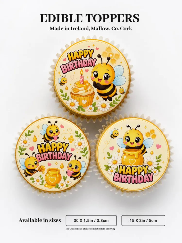 Cute yellow and black bumble bee birthday cupcake edible toppers with pink text floral designs on wafer paper icing sheet