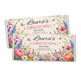 A personalised 40g chocolate bar wrapper with pink blue and yellow flowers and painted butterflies for lauras christening