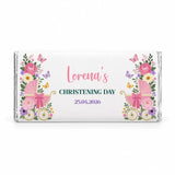 A personalized white chocolate bar with pink pram and butterfly floral design for lorena’s christening day 25.04.2026