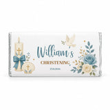 A personalised 40g white chocolate bar with blue and gold floral designs featuring a dove candles and seashells for christening