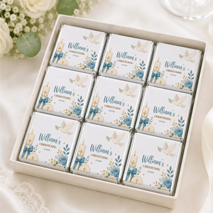 White chocolate squares with blue floral and dove designs personalized for williams christening loose wrapped mini neapolitans