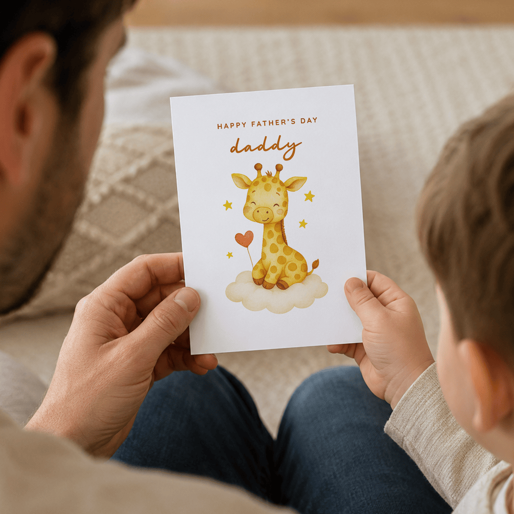 Child holding a Father's Day card with a giraffe illustration and 'Happy Father's Day daddy' text.