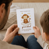 Child holding a Father's Day card with a monkey illustration and text.
