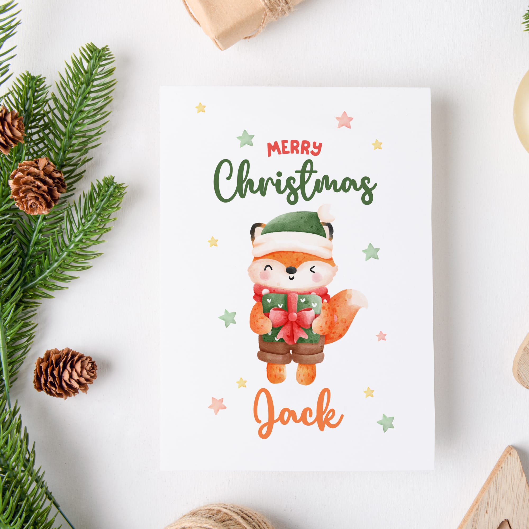 Christmas card with a fox illustration and 'Merry Christmas Jack' text, surrounded by festive elements on a white background.