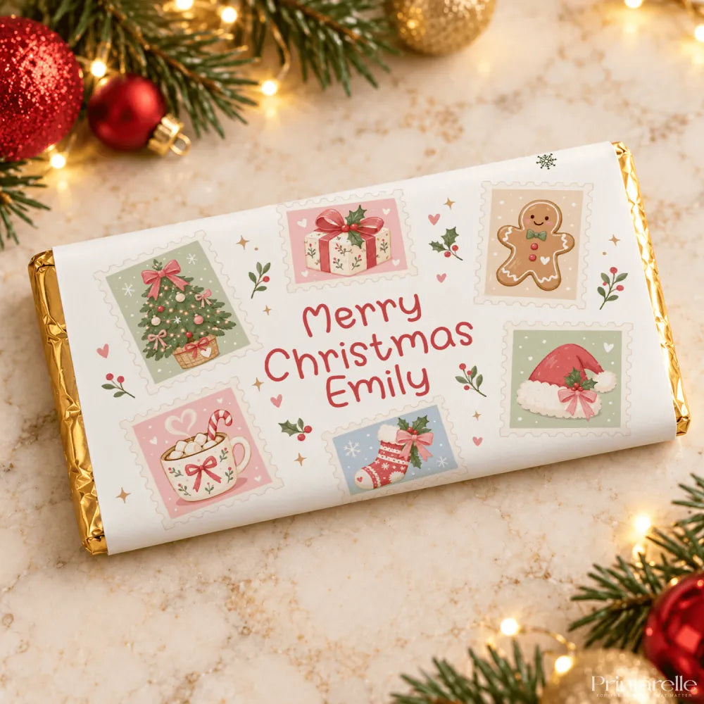 A personalized white christmas chocolate bar wrapped in gold foil with gingerbread man illustrations and merry christmas emily message