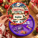 A festive red and white striped tub sticker with christmas treats design and personalised deliver to sophie name tag