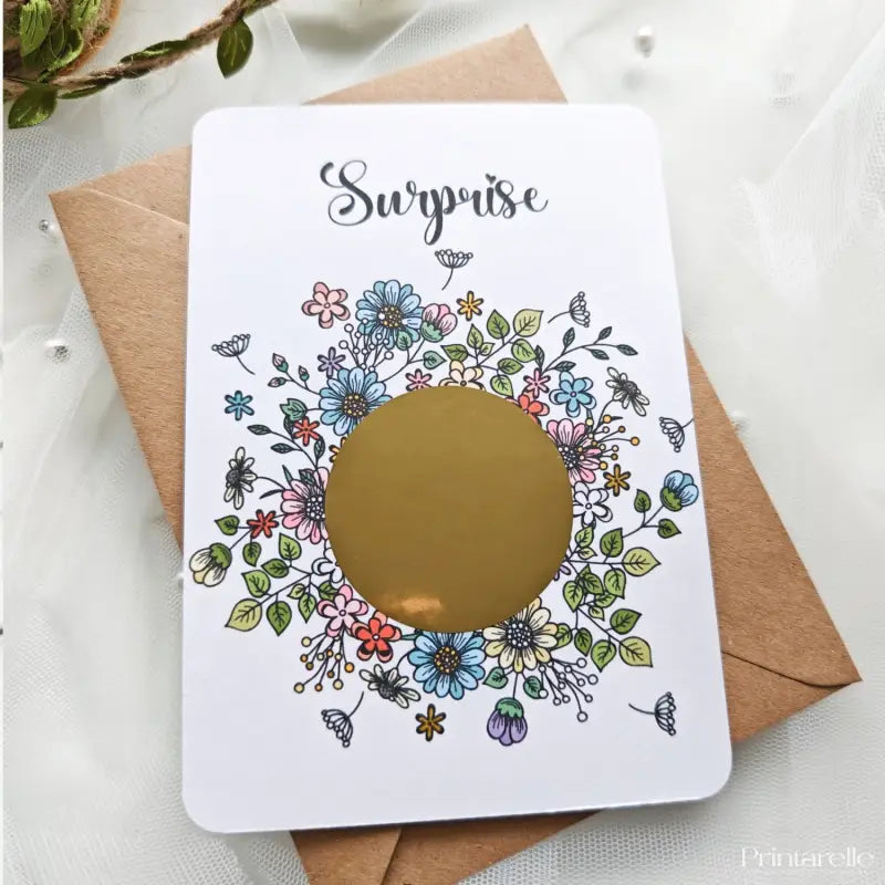 Floral scratch reveal card with colourful wreath design