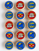 Comic hero personalised edible cupcake toppers with red blue yellow icing sheet featuring happy birthday cillian and pow graphics