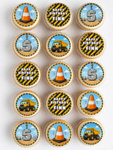 Construction 5th birthday personalised cupcake toppers with orange cones yellow dump trucks and number 5 on icing sheet