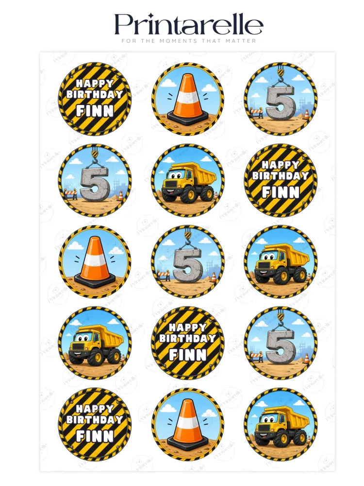 Yellow cartoon dump truck cupcake topper with smiling face on icing sheet for construction 5th birthday party