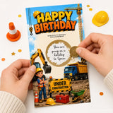 A vibrant construction birthday scratch card with a cartoon builder, excavator, and dump truck under a blue sky