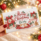 A personalised white chocolate christmas chocolate wrap with festive illustrations gold foil edges and green script emily name