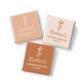 Three mini neapolitan chocolates with beige and terracotta labels for confirmation day featuring a decorative cross