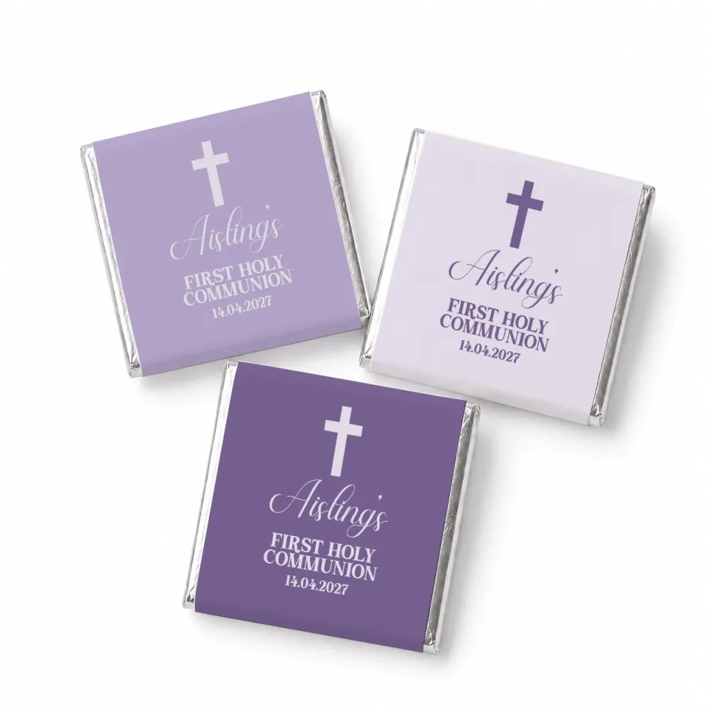 Lavender and white mini neapolitan chocolates wrapped in silver foil with cross design for holy communion favors