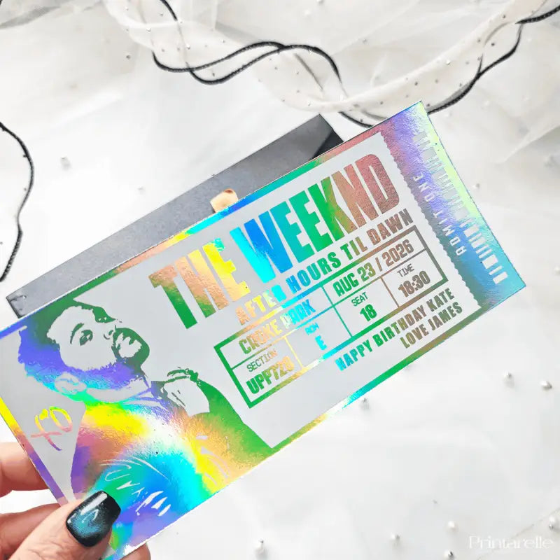 Holographic concert ticket for The Weeknd with colorful design on a white background
