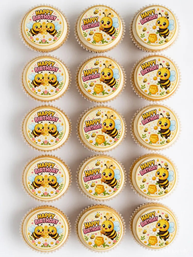 Cute yellow and black edible bee cupcake toppers with happy birthday text and honey pot design for parties