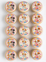 Cute puppy birthday edible cupcake toppers with colorful icing designs perfect for fun cupcake toppers